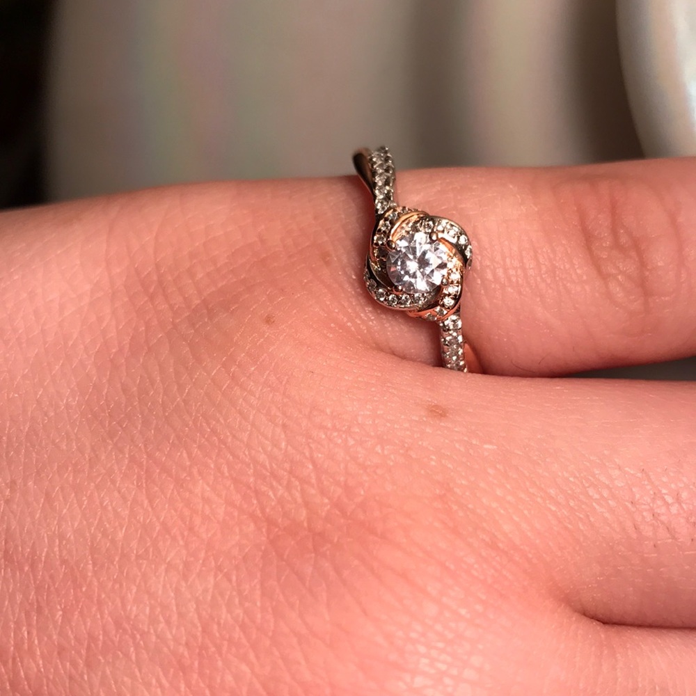 Silver and gold flower ring.